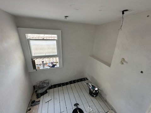 Walls made good and floor prepared