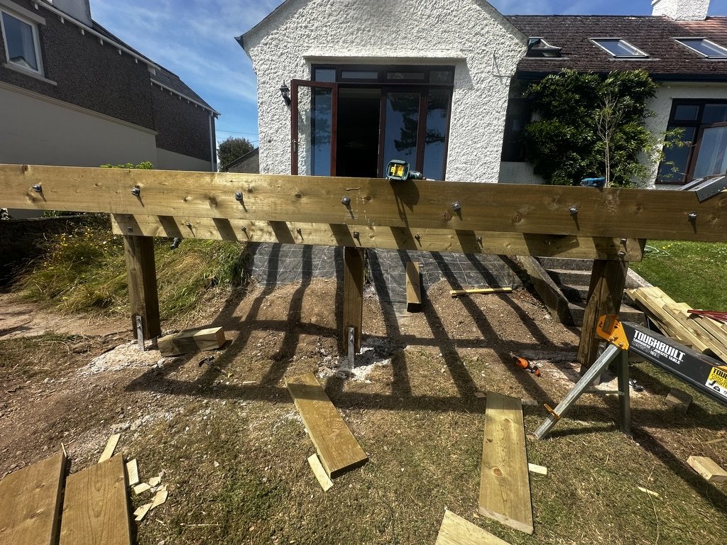The frame from below showing beams and bracing