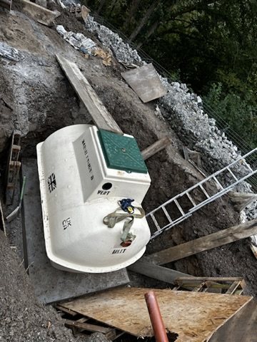 Sewage treatment plant set in its excavation