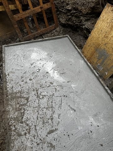 Concrete base cast in an excavation for the treatment plant
