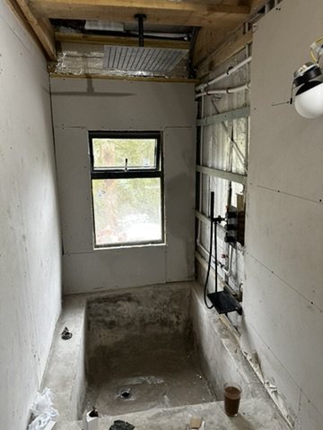Sunken bath formed in the bathroom floor before finishing