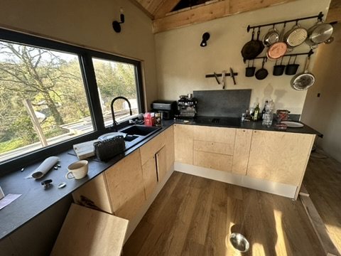 Finished birch plywood kitchen with dark worktop